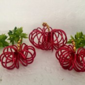 Mini Floral Wire Pumpkins - pumpkins arranged with some greenery
