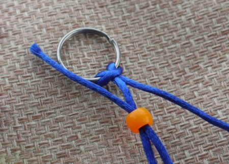 Beaded Key Ring - pass the second cord through the bead in the opposite direction