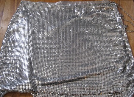 A dress made from a metallic mesh fabric.