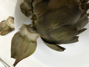 removing Steamed Artichoke leaves