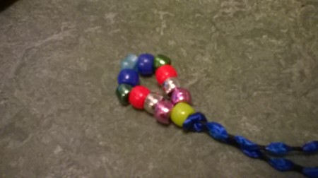 Tie a knot behind to keep them all together.