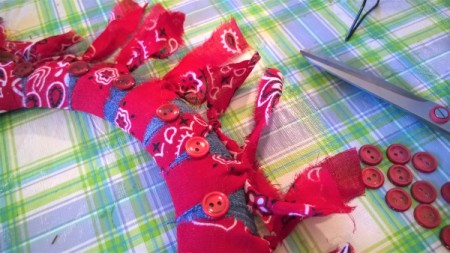 Denim and Bandanna Wreath - glue a button to each denim space