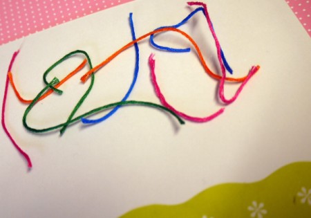 Hanging Baubles Greetings Card - cut embroidery floss into different lengths