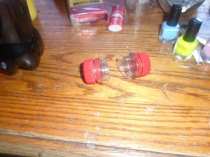 Two bottle caps to be screwed together for a ring stored inside.