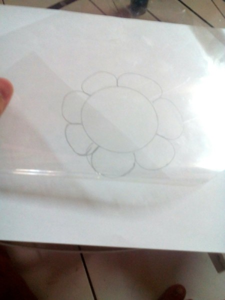 Glittered Glass Coaster Made from Hot Glue - if not using parchment paper cover with a sheet of acetate