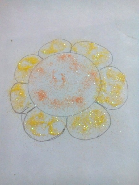 Glittered Glass Coaster Made from Hot Glue - sprinkle glitter inside the design