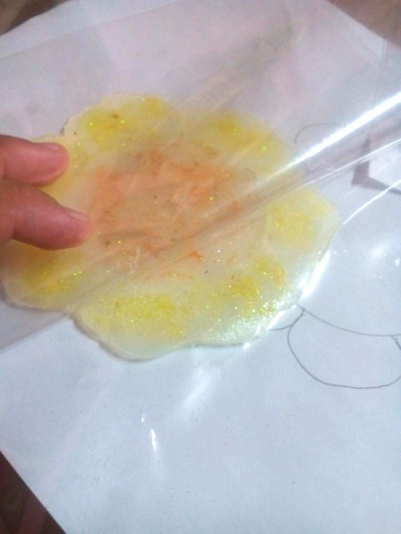 Glittered Glass Coaster Made from Hot Glue - allow to set up and cool