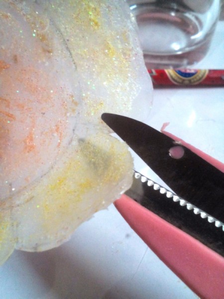 Glittered Glass Coaster Made from Hot Glue - retrace the lines and trim with scissors