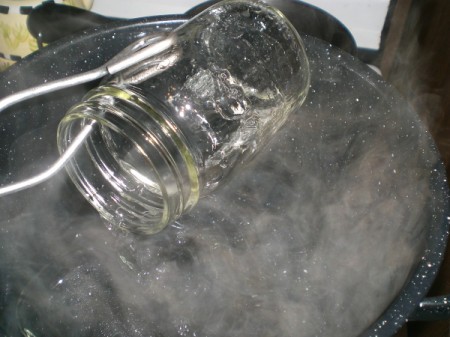 sterilizing jar in hot water