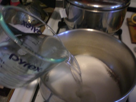 adding vinegar to sugar