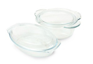 A set of glass cookware with lids.