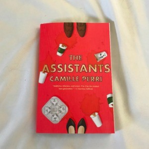 A library book called "The Assistants" by Camille Perri