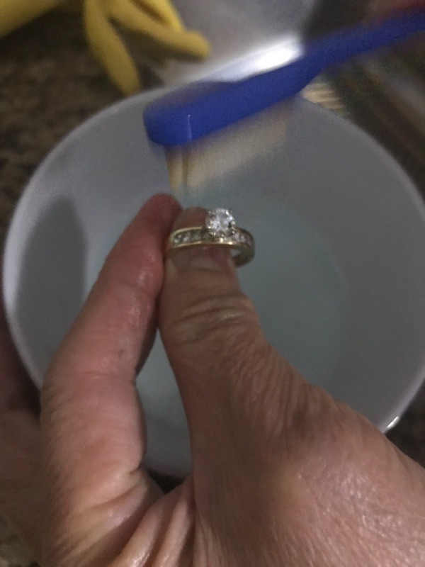 Using a toothbrush, clean the diamonds with a soapy solution.