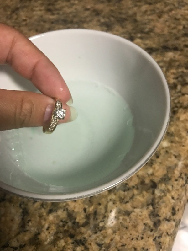 A shiny diamond ring, after being cleaned.