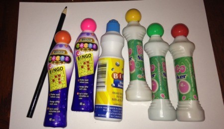 A collection of colorful bingo markers.