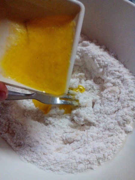 adding butter to flour mixture