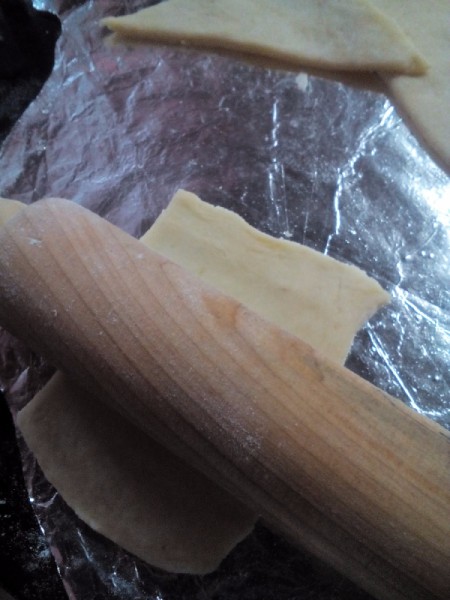 rolling dough on foil