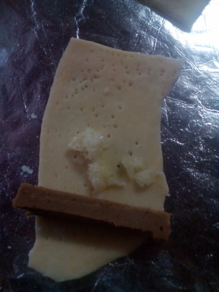 cheese added to dough piece