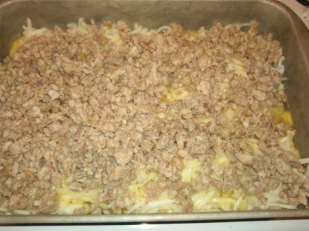 cooked sausage over hashbrowns