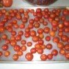 Frozen Small Tomatoes on cookie sheet