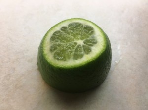 A lime section with the pointy end cut off.