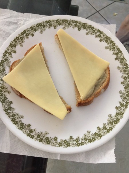 Cheese on Artichoke Spread on bread