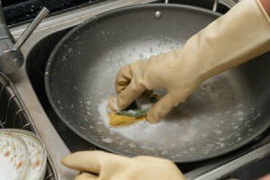 Cleaning a pan.