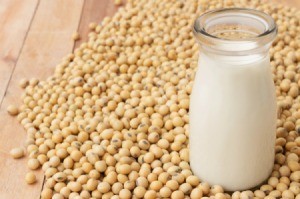A photo of soy beans and soy milk.
