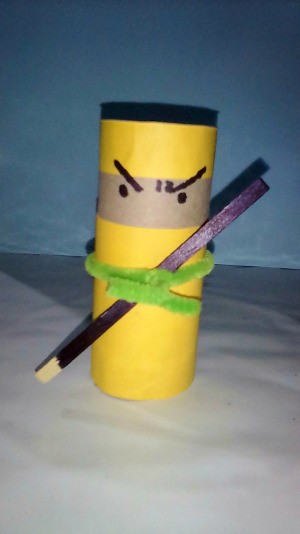 A completed ninja made from a recycled toilet paper roll.