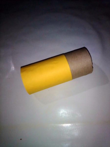 Yellow strip of paper glued on to make the lower body.