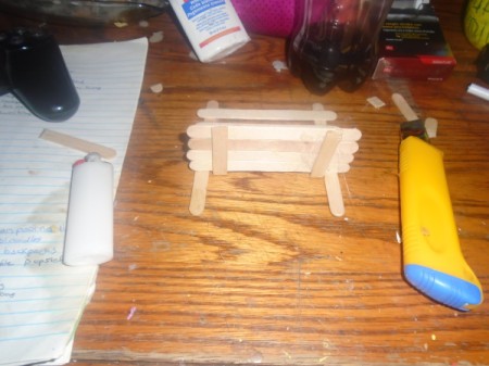 Popsicle Stick Gazebo and Bench - glue the seat to the back of the bench