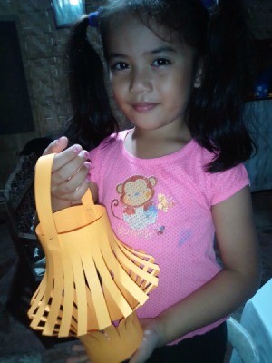 Making a Paper Lantern - little girl holding the lantern