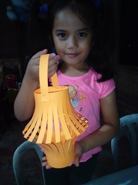 Making a Paper Lantern - little girl holding the lantern