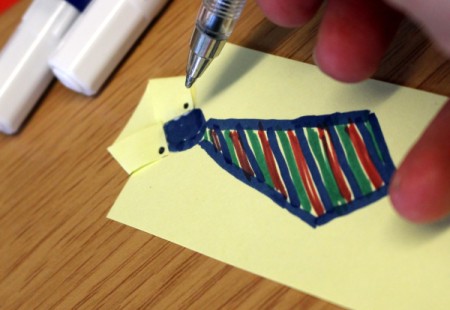 Adding button details to the tie bookmark.