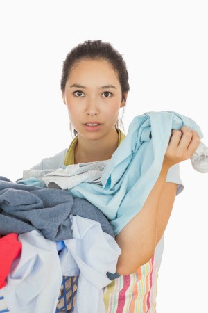 A woman with a laundry basket.