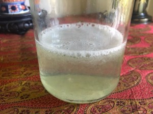 Homemade mouthwash in a canning jar.