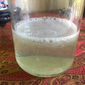 Homemade mouthwash in a canning jar.
