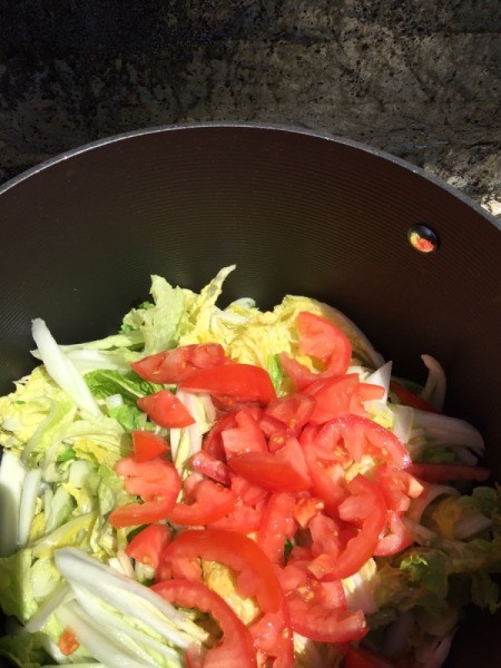 Napa Cabbage and tomato in pan