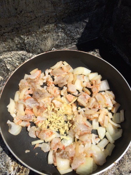 ginger added to onion and shrimp