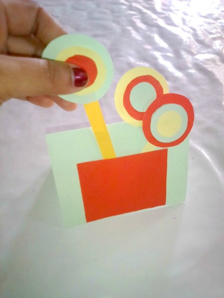 Simple Flowers with Paper Vase - inserting a finished flower into the paper vase