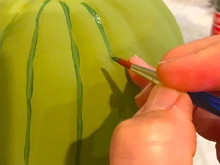 Foam Pumpkin Faux Cactus - paint lines using the dark green paint in the pumpkin grooves