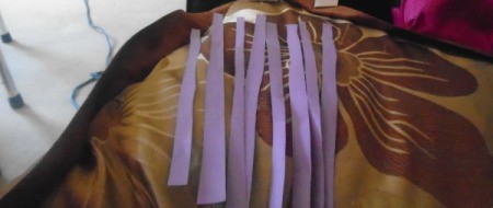 Making Pretty Paper Bows - cut 8 thin strips of paper