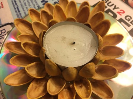 Pistachio Shell Flowers and Candle Holder - lay each subsequent row of shells down a bit more like a blooming flower