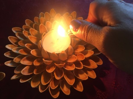 Pistachio Shell Flowers and Candle Holder - lighting candle