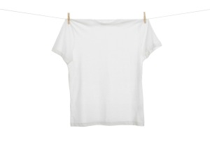 A t-shirt hanging on a clothesline.