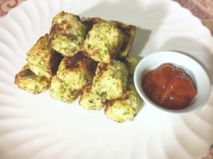 Broccoli Cauliflower Tater Tots on plate with dipping sauce