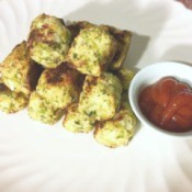 Broccoli Cauliflower Tater Tots on plate with dipping sauce