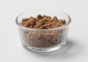 A bowl of soft brown sugar.