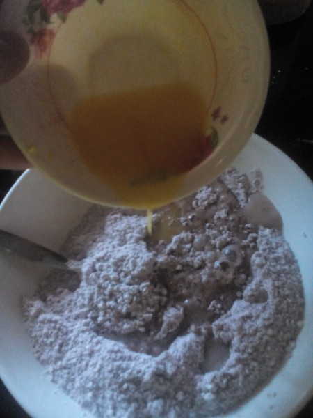 Double Chocolate Donuts adding yeast mixture