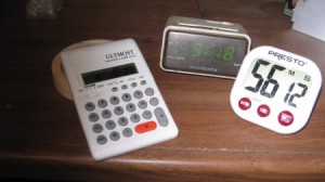 A variety of different timers and alarm clocks.